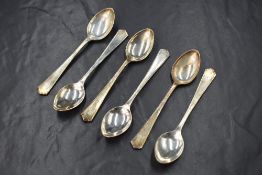 A cased set of George VI silver teaspoons, having decorative terminals with 'R' initial, marks for