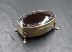 An early George V silver and tortoise shell trinket box, the silver oval box having a