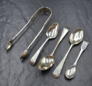 A pair of Victorian silver fiddle pattern sugar tongs, having 'ES' monogram, along with 19th century