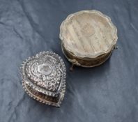 A late Victorian silver trinket box, of heart form with crimped rims and embossed scroll