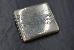 A 20th century Japanese white metal cigarette case, of hinged rectangular form having traditional