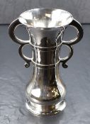 A George V silver replica stirrup cup, of slightly bulbous form having a flared rim, moulded banding