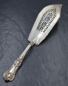 A William IV silver Queen's pattern fish slice, having a heraldic crest to terminal, pierced