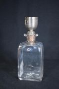 A Victorian silver topped portable glass picnic decanter, of rectangular form having a