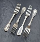 Two George IV silver fiddle and thread pattern forks, along with two Victorian examples, three
