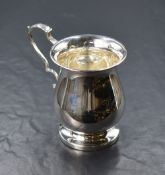 A George V silver tankard, of bulbous form having a slightly flared rim engraved 'Heather Nov.25th
