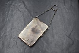 A George V silver card case, of rectangular form having 'AJD' to the top, with chain and loop, marks