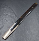 An Edwardian silver mounted tortoiseshell page turner, of traditional form, marks for London 1902,