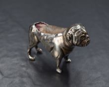An Edwardian silver novelty pin cushion, modelled as a bulldog, having dark fabric to the body,