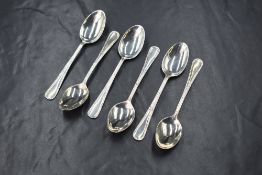 A cased set of six Elizabeth II silver teaspoons, having thread decoration, marks for Sheffield