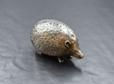 An Edwardian silver novelty pin cushion, modelled as a hedgehog, marks for Birmingham 1903, maker