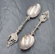A pair of Dutch import 19th/20th century silver commemorative spoons, having ornate pierced