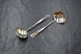 A pair of Arts & Crafts sauce spoons, having wire decoration to the terminals, marks for Edinburgh