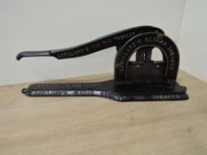 Lorillard's Climax Red Tin Tag Tobacco Cigar Cutter, cast iton and painted, stamped underneath