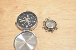 Two compasses, largest w4.5cm
