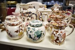 A quantity of Mason ironstone pitchers and ginger jars ect