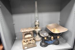 A 19th century oil lamp, h60cm, sold together with a weighing scale ect, (3)