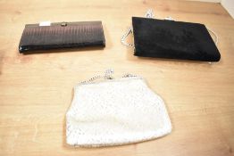 Two lady's clutch bags, (3)