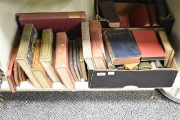 A box containing various books, to include A Young Sea Rover, The Story of Twenty Five Years and The