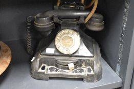 A black 'pyramid' style telephone box phone, h20cm