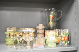 A vintage glass pitcher decorated with fruit motifs, h21.5cm, sold together with 4 matching