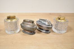A pair of Ronson Varaflame gas lighters in the Art Deco style, L9cm, sold together with a pair of