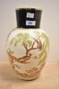 A Crown Albion ceramic vase of baluster form decorated with exotic birds and floral patterns, makers
