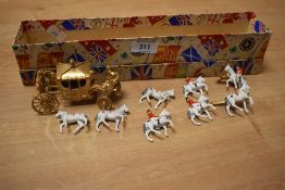 A coronation metal carriage and horse model having original box, L34.5cm