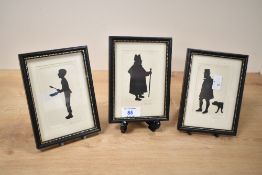 A set of 3 Charles Dickens silhouettes, signed bottom right, H15.5cm