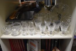 A crystal cut glass water jug decorated with diamond patterns and globular handle, h14.5cm, sold