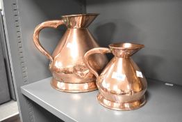 A pair of Antique copper measures , Gallon and Quart sizes, having a few indentations but bases look