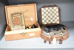 A replica medieval chess board decorated with Celtic patterns, w24cm, A/F, sold together with a