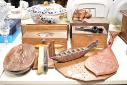 An early 20th century oak smokers box decorated with geometrical inlay patterns, w32cm, sold