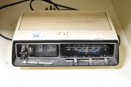A retro Sanyo Sterocast clock having AM/FM radio, alarm function and flip clock display, 'Made in