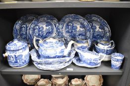 A blue and white Copeland Spode 'Italian' pattern dinner service, decorated with landscape scenes,