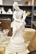 A Parian ware figurine modelled as a classical Goddess holding a bouquet of flowers, h48cm