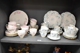 A Shelley fine bone china tea service, painted and factory marks to base, pattern 'Rd 468736'.