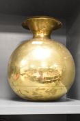 A large eastern brass bulb shaped vessel, h34