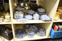 A Spode blue and white dinner service decorated in the 'Italian' pattern, to include tureen, dishes,