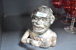 A metal jolly gent money bank, h16cm