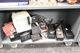 A vintage television having AM/FM radio control, h19.5cm, sold together with a Philips portable