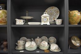 A Haddon Hall 'Minton' pattern bone china tea service, decorated with floral patterns on a white