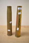 A pair of brass shell cases, marked to base '1939', h31cm