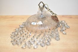 A 20th century 'Jelly Fish' chandelier decorated with cut geometrical patterns, w24cm
