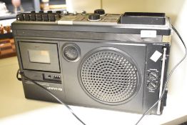 A 1970's Sharp All-in one radio, cassette and Tv system, L44cm
