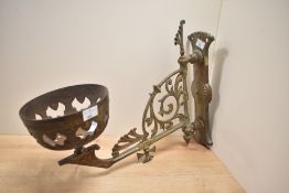 A metal wall sconce decorated with scrolls, L42cm