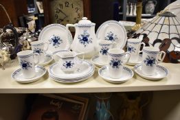 An Adams English Iron Stone coffee service decorated with floral patterns, to include tea pot,