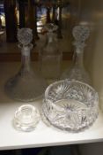 A group of crystal glass decanters sold together with a bowl and candle holder, (5)
