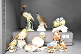 A border fine arts bird figure having makers mark to base, h8.5cm, sold together with a stork and