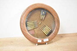 A circular wall mounted cartridge display board, w30.5cm